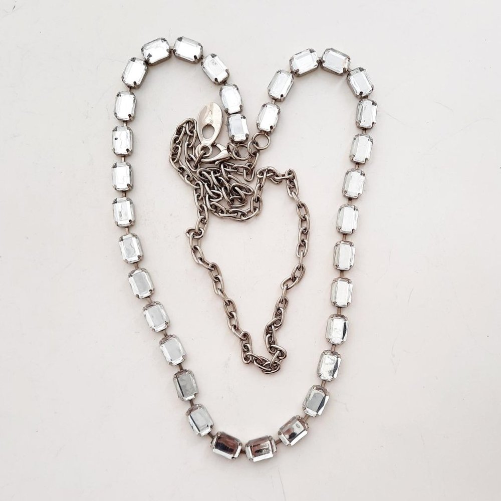 Long flapper style rhinestone necklace, a couple of rhinestones have spots
